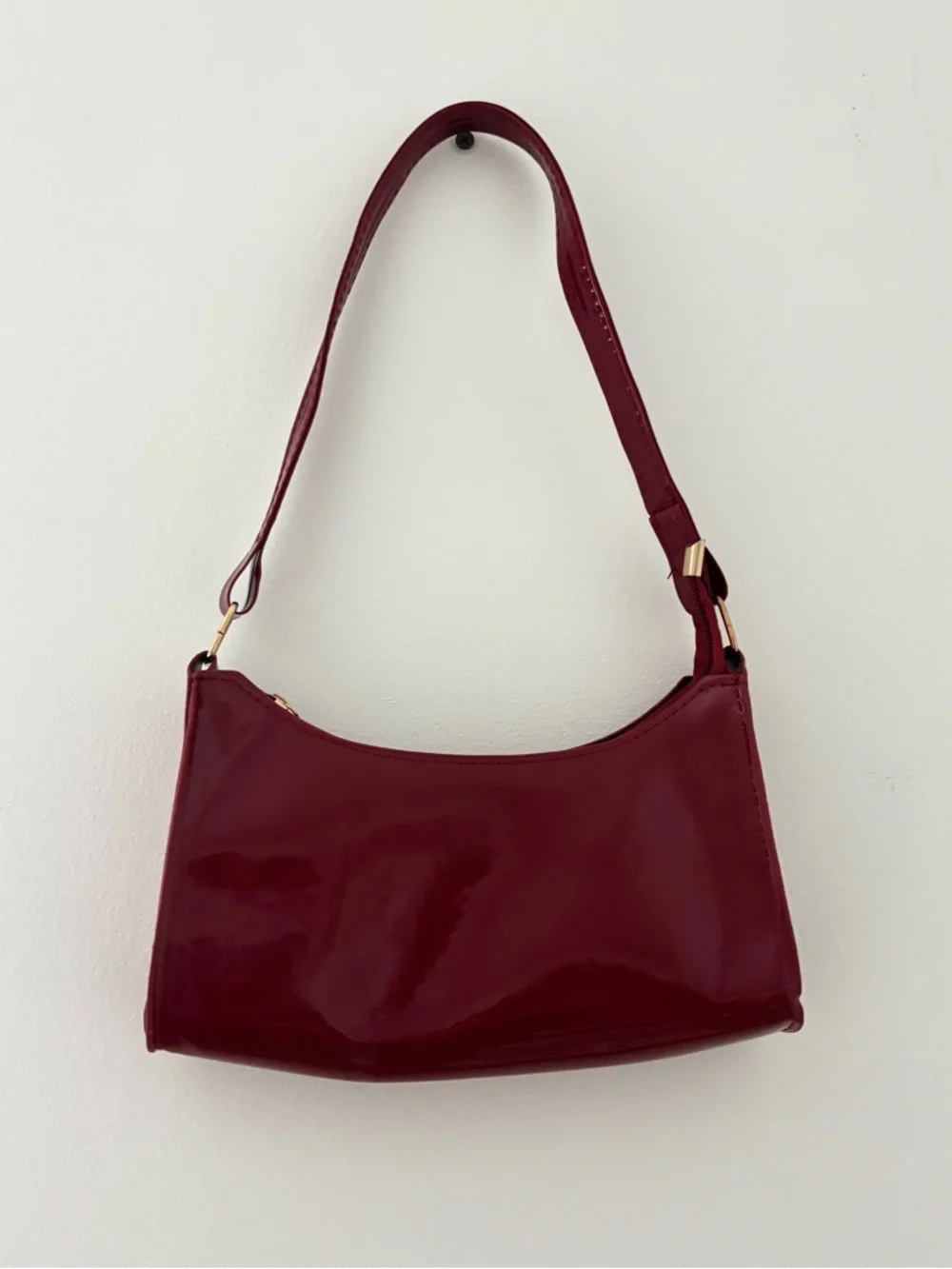 burgundy shoulder bag with gold zipper